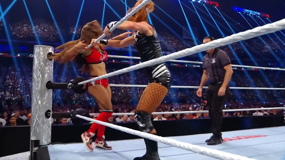 IT'S A SLUGFEST IN PARIS! 👊 The Intercontinental Title is on the line and both Becky Lynch and Nikki Bella plan to leave with the gold! Who will be the one to do it? 🏆🌐