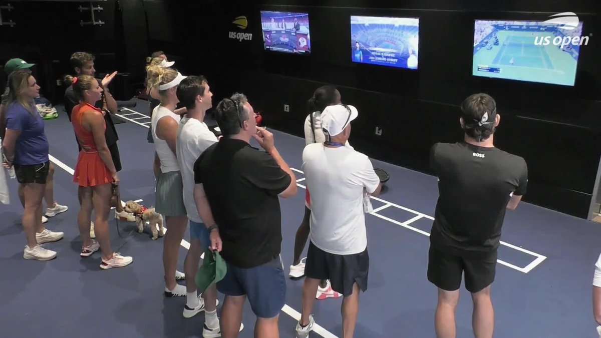Even players trying to warm up and cool down have stopped to watch the drama in Armstrong 👀