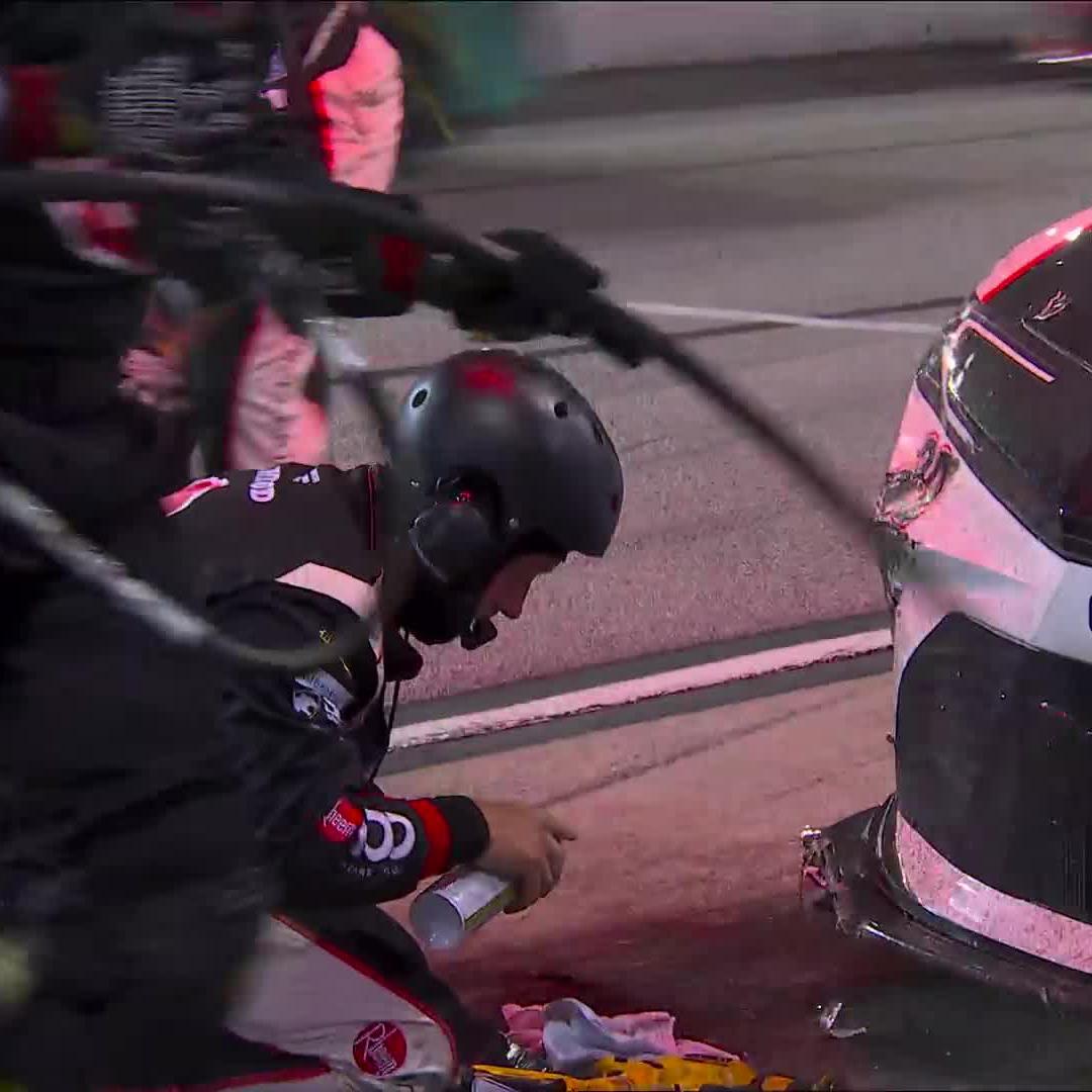 The No. 20 crew is hard at work to repair Christopher Bell's machine.