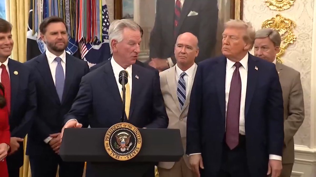 Trump's hand is seemingly covered by makeup again during his press conference