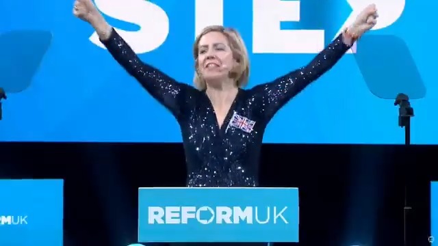 Reform UK's Dame Andrea Jenkyns leads the conference hall in a singular chant of "Nigel will be Prime Minister".