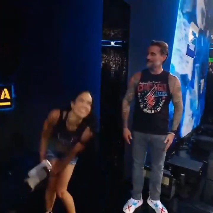 Man, look at CM Punk you can see it in his eyes this ain’t 'Cult of Personality' It’s pure happiness from a husband seeing his wife back in the ring after so many years 🥹❤️