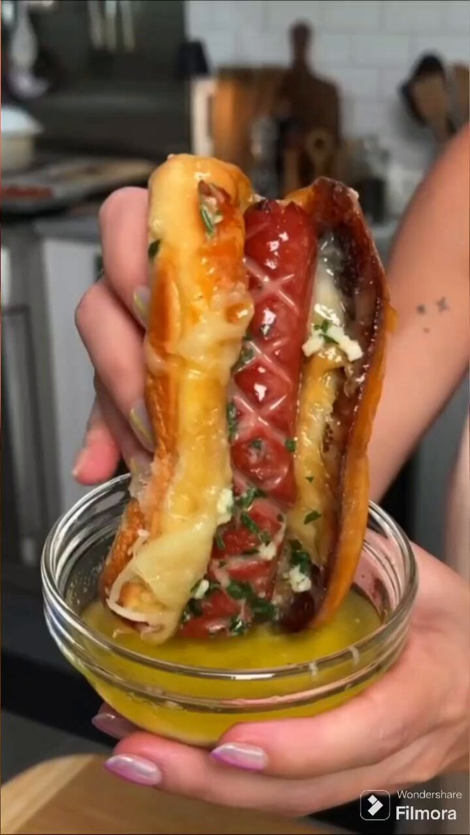 🍽 Garlic Butter Grilled Cheese Hot Dog 👩🏻‍🍳 Natalie Gravois | Allrecipes 📝 Recipe In The Comments