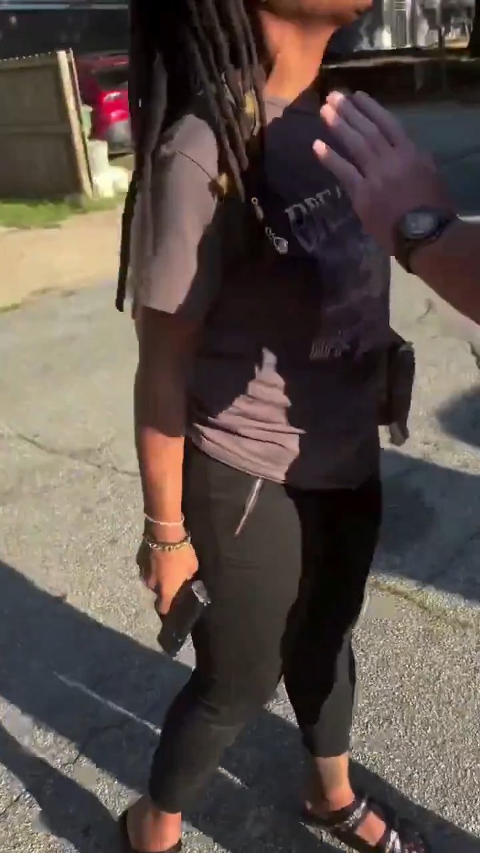 Brandon Parker was driving home from the Atlanta zoo with his three sons, ages two, eight, and fourteen, when his vehicle was struck by another car. The woman driving attempted to flee but he followed. She then gets out pointing a gun at him and his son. He forcibly disarmed her and during the struggle she desk popped into the pavement. The only surprising thing about the video is she actually had a solid carry gun... #CityLife #atlanta #zoo #disarmament #roadrage #FAFO #crime #decay #urban #democrats