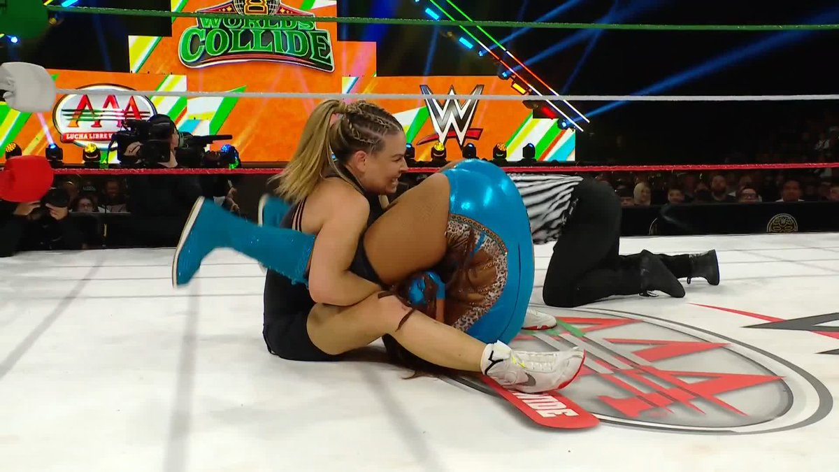 WWE should sign this Nattie woman. She's like a far better and more interesting version of Natalya, you know? #WorldsCollide