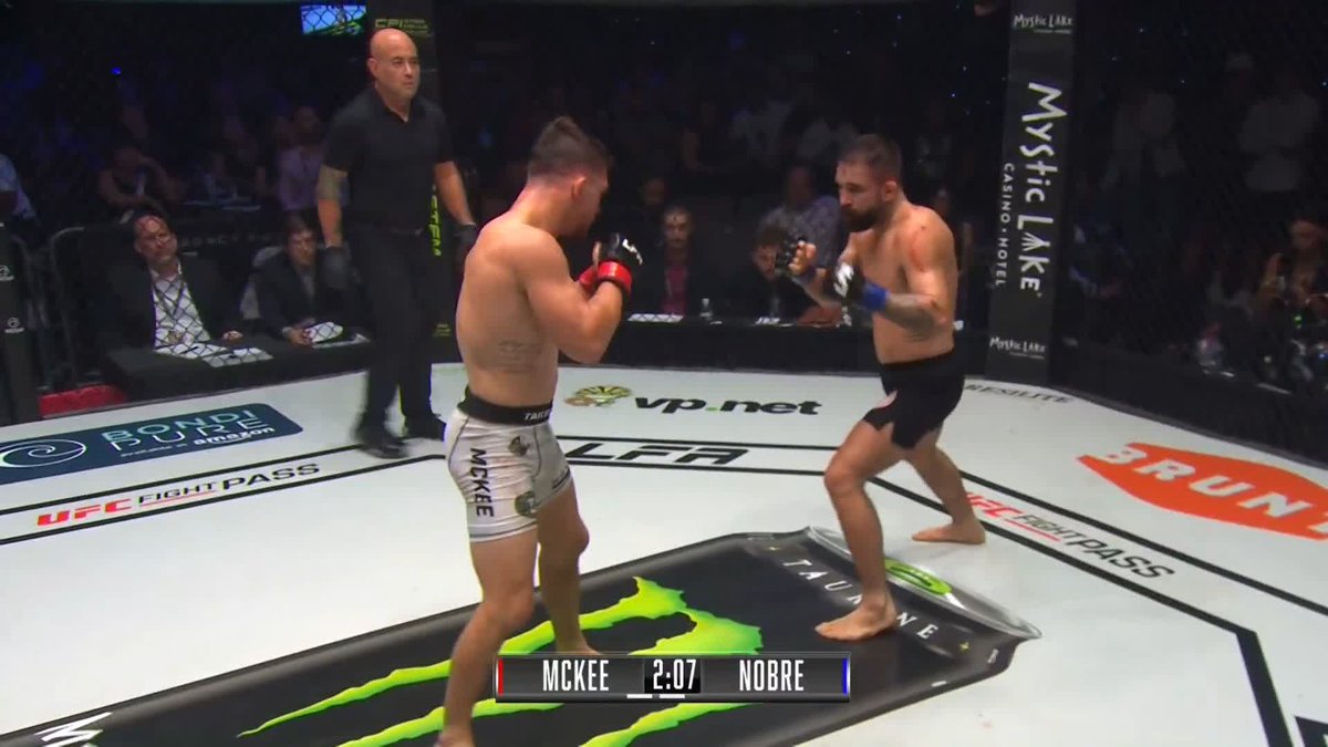 WHAT AN EXCHANGE!! MITCH MCKEE GETS THE KO VICTORY IN ROUND 2 🤯🤯 #LFA217