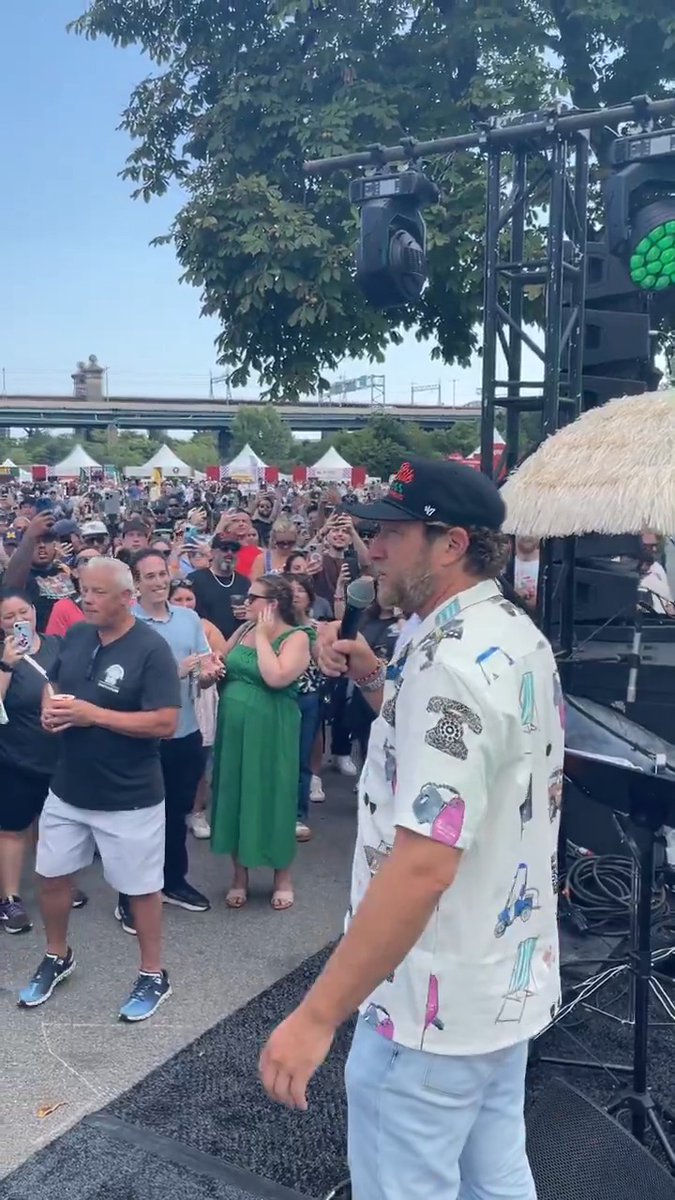 The worst introduction of all time on the world's tiniest stage but thank you to the pizzerias and everyone coming to the One Bite Pizza Fest