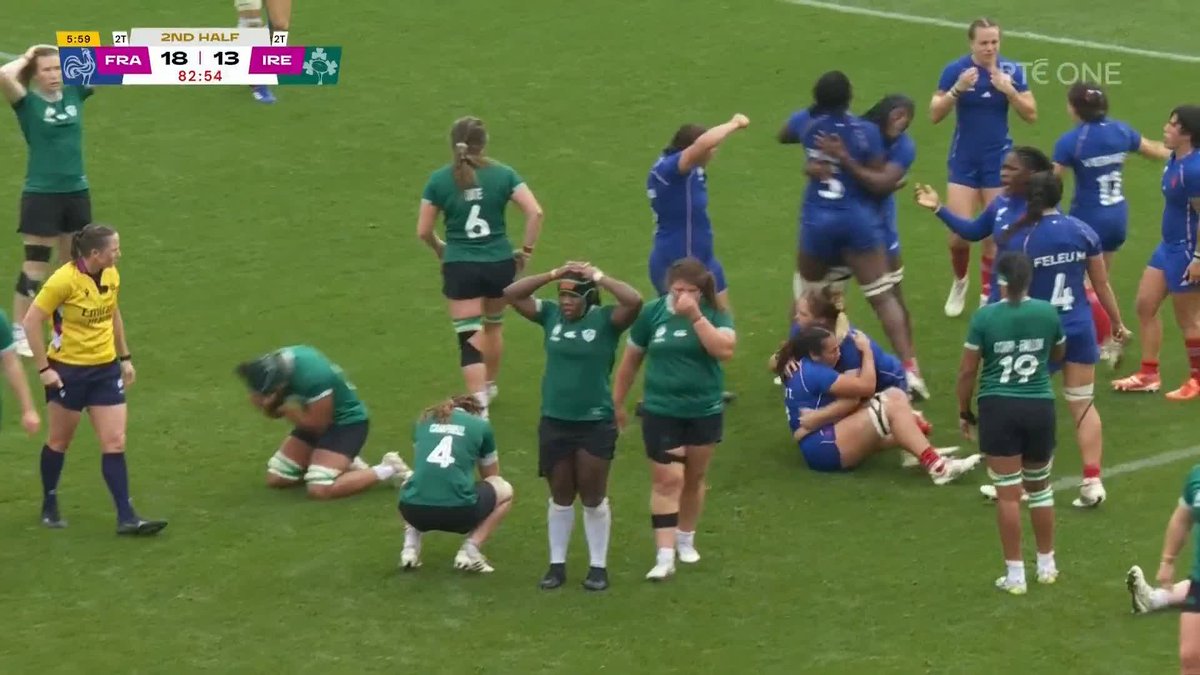 The French player swats the ball forward one handed and isn't in a realistic position to legally win possession with that movement That should have been a penalty to Ireland for a deliberate knock on