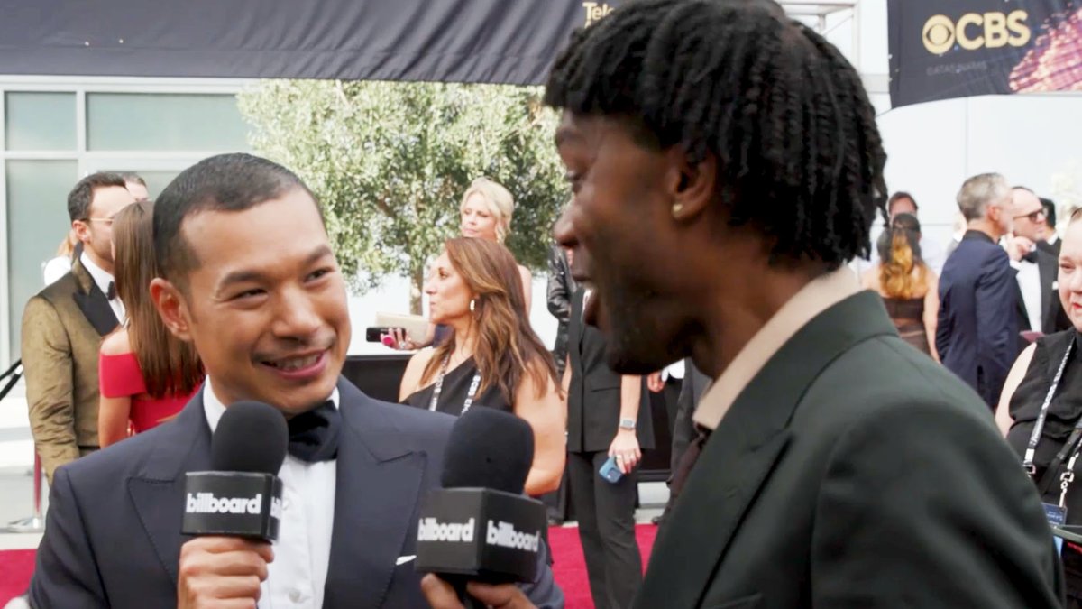 What is Tayme Thapthimthong's favorite LISA song? 👀 He tells Billboard News what music the 'White Lotus' castmates listened to together and more on the Emmys red carpet.