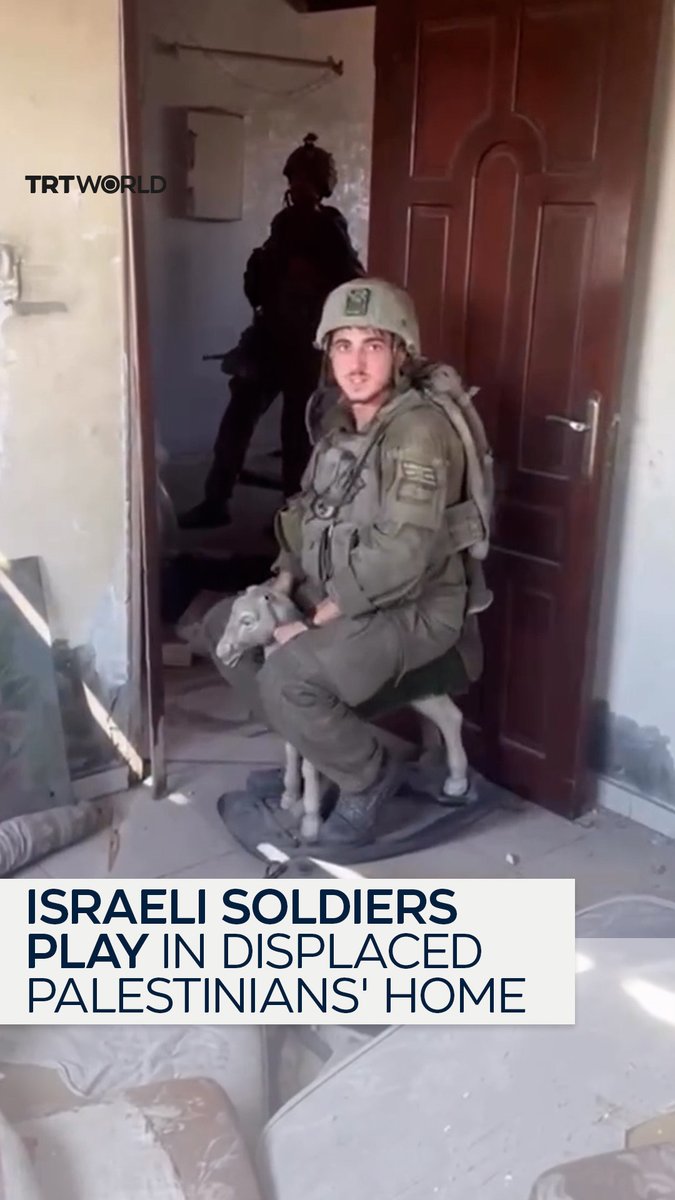 Israeli occupation forces are seen playing inside the home of a Palestinian family they forcibly displaced from Gaza’s Sheikh Radwan neighbourhood
