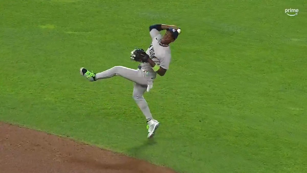 Jazz Chisholm Jr. contorts his body to make a spectacular throw for the out!