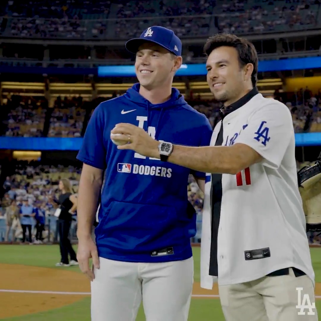 From the podium to the mound. Thanks for stopping by Dodger Stadium, Sergio Pérez!