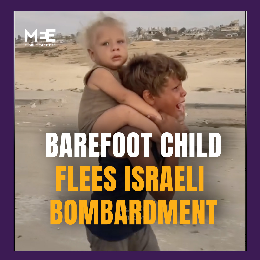 A barefoot Palestinian boy from northern Gaza was seen crying and calling out for his mother as he carried his baby sister in his arms, walking south in search of safety amid ongoing Israeli bombardment