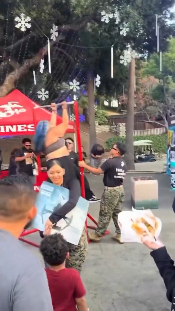 High calorie woman with multi-colored hair attempts to do a pull up at a Marine Corps recruiting station. It goes exactly how you think it will... #USMC #obesity #recruiting #diabetes #MarineCorps #fail #nope