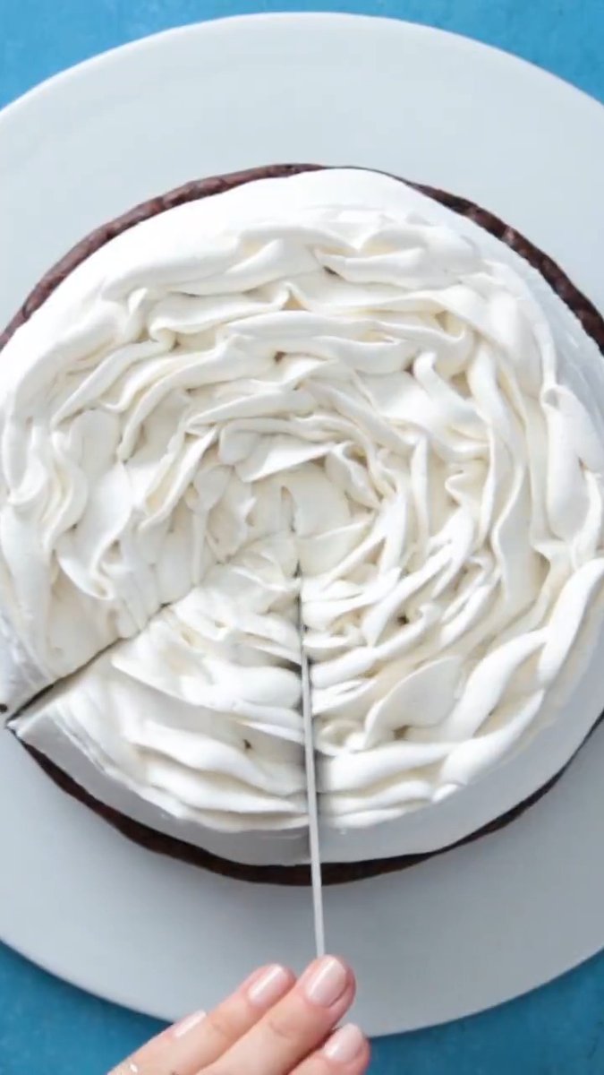 Caramel brownies with the CUTEST whipped cream flower.