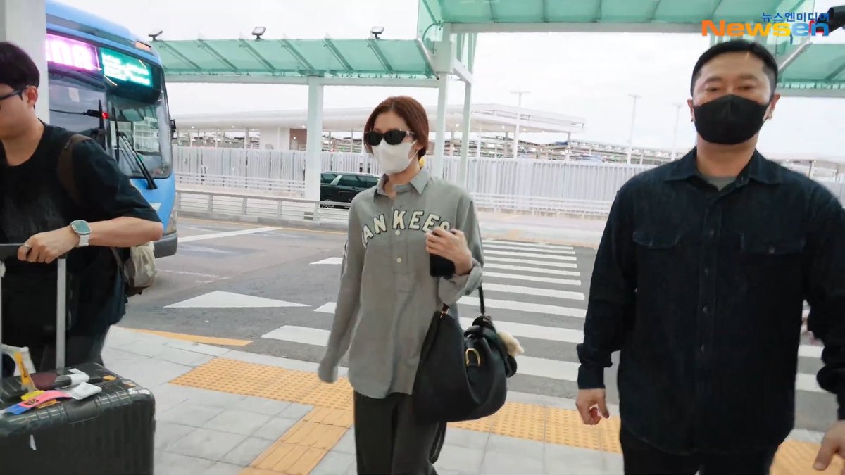 Sana at the airport today heading to an overseas schedule.