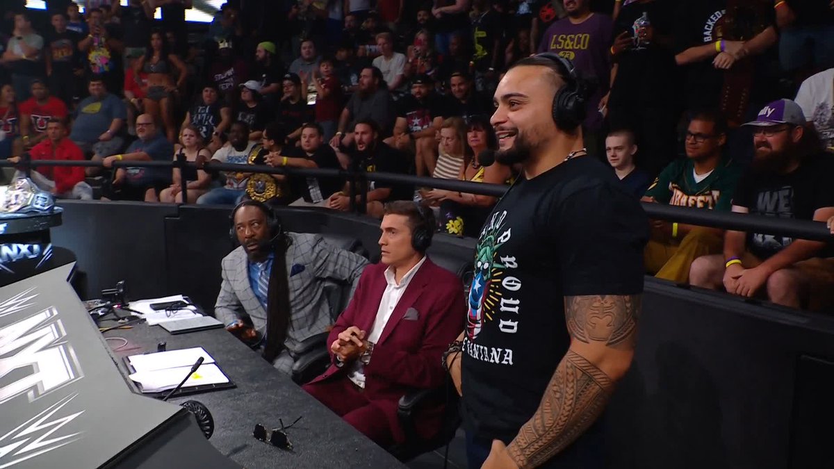 This is interesting... Mike Santana just joined Vic Joseph and Booker T. Huffman on commentary for the main event! 😳