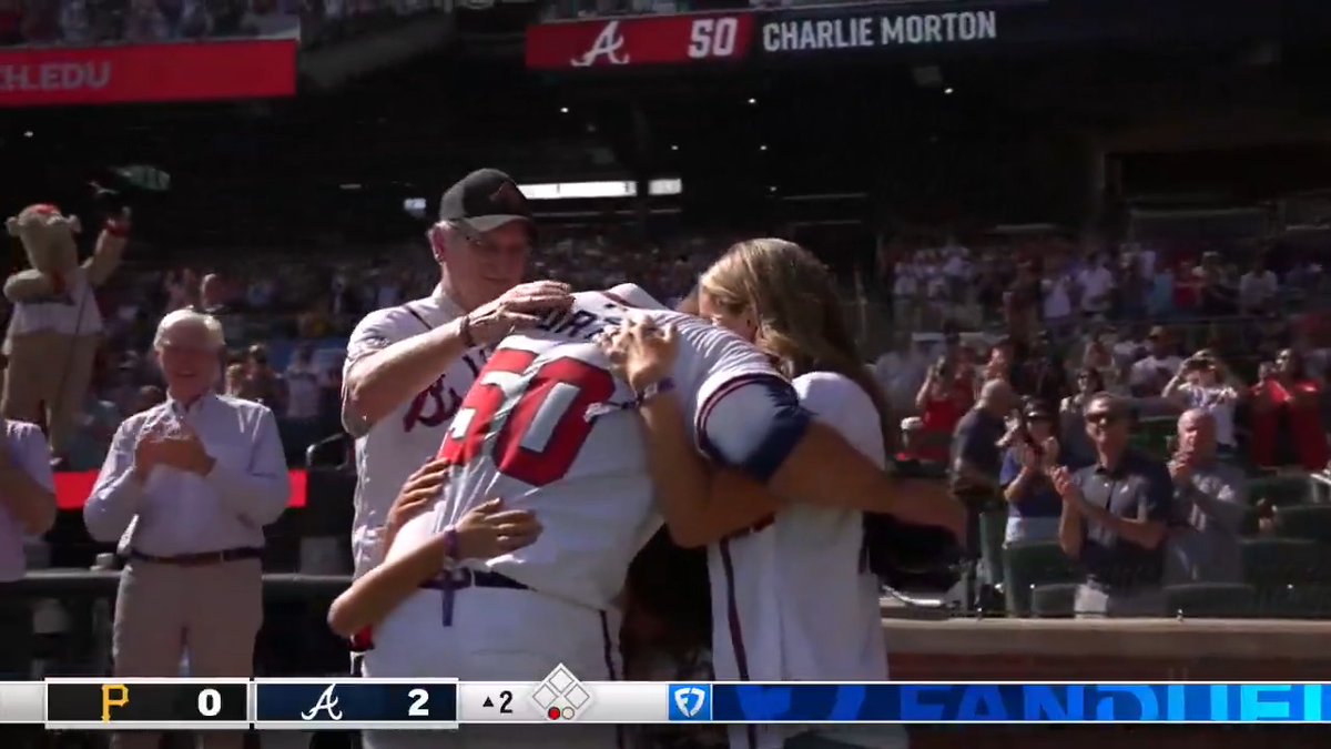 Charlie Morton is greeted by his family on the field after walking off the mound for the final time this season 🫶
