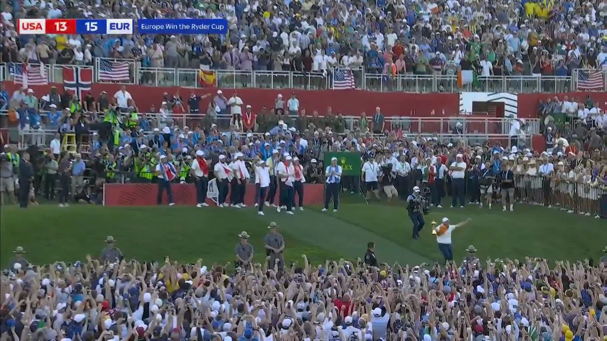 Shane Lowry runs the Ryder Cup down the hill from the 18th green to celebrate with the Irish fans. Is it too late to get this man on the ballot for the presidency?