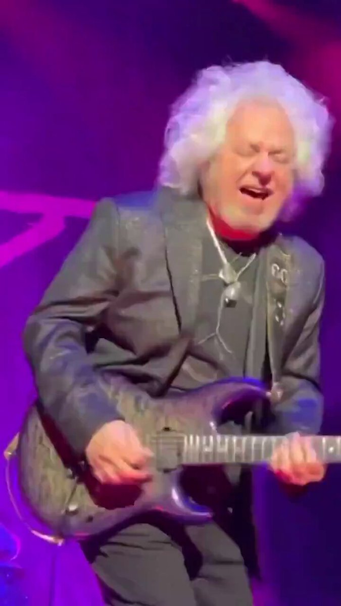 Steve Lukather of Toto rocking out on stage performing "Hold The Line" Probably one of the most underrated guitarists.