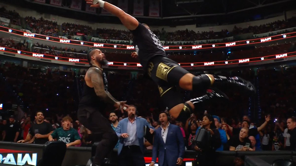 THROUGH! THE! TABLE! The Usos and The Vision are NOT holding back tonight! 🫢