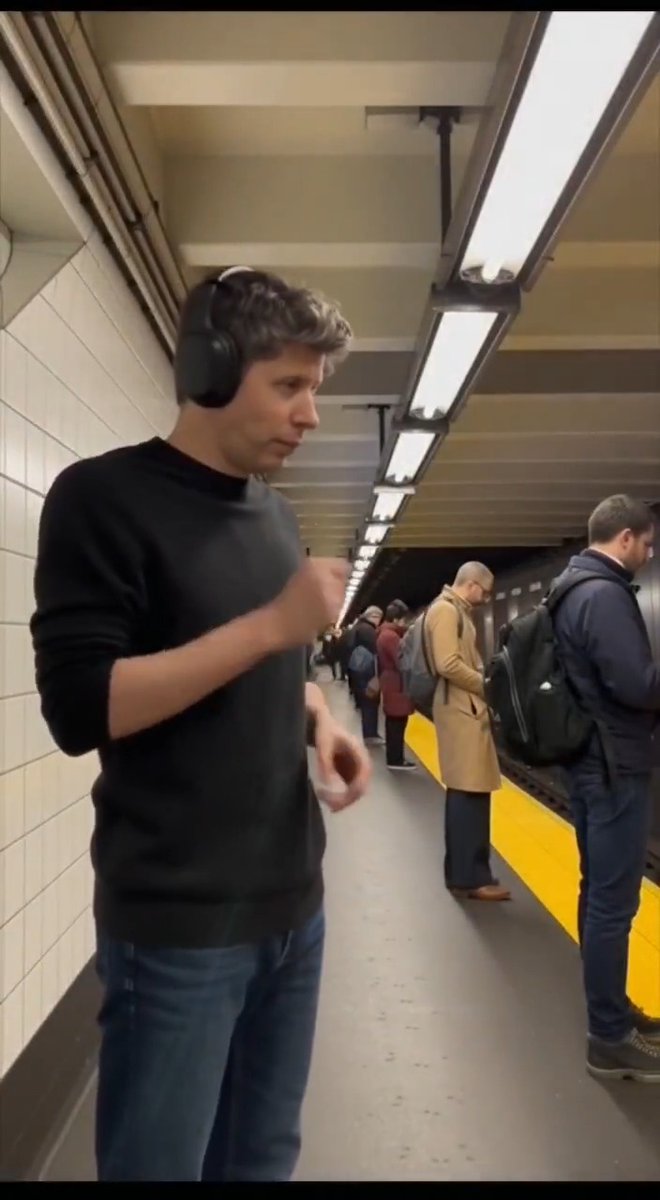 sora 2: sam altman goes into train station and makes everyone dance with him