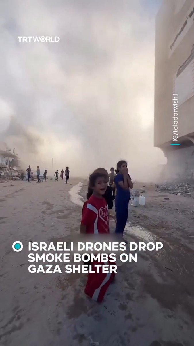 Palestinian children cry in panic after Israeli drones drop smoke bombs at a school shelter in northern Gaza. The smoke distorts visibility, spreads fear and lets young children lose their sense of safety in a temporary shelter