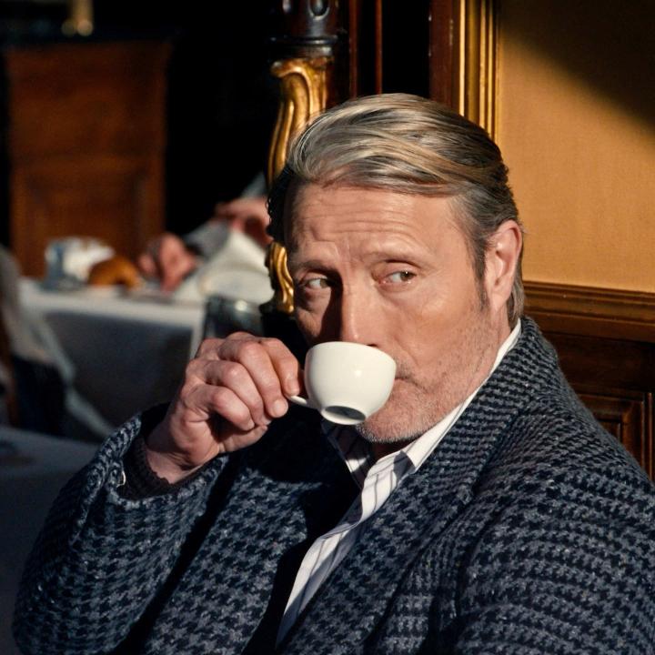 QUIET ELEGANCE IN TORINO Mads Mikkelsen Official pauses for a mid-morning espresso. Like the elegant pieces that he wears, he speaks softly but with unmistakable authority. #ZEGNA #ZEGNAWINTER25
