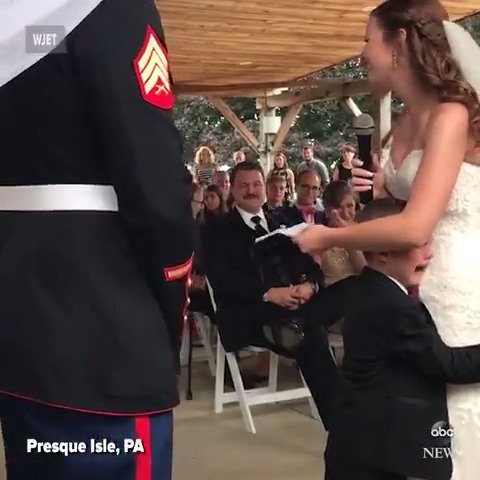 A Marine's young son breaks into tears as he hugs his new stepmom during the wedding ceremony.. She must be an amazing woman for this little boy to respond with so much love