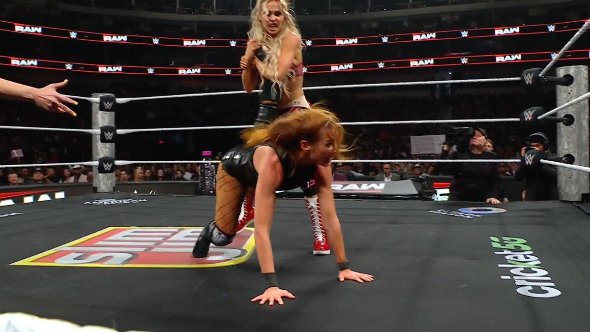 Here comes MAXXINE DUPRI! She's got Rebecca Quin on the ropes!! 😲