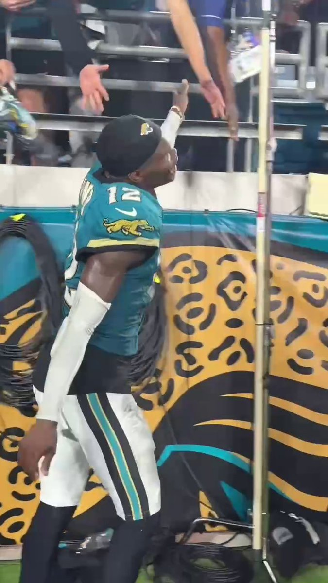Travis Hunter celebrating with fans after the dub against the Chiefs 🙌