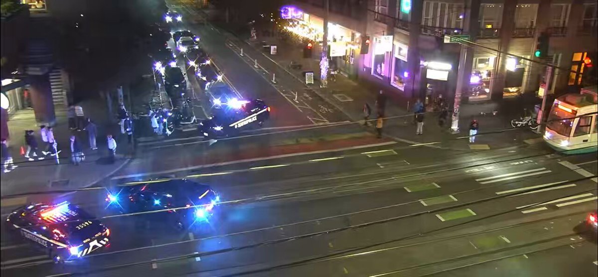 BREAKING NEWS: Shooting at the crime ridden corner of Broadway &amp; Pike Street. One victim down with GSW to the chest no pulse. SPD looking for two masked suspects that fled the area in a white dodge charger.