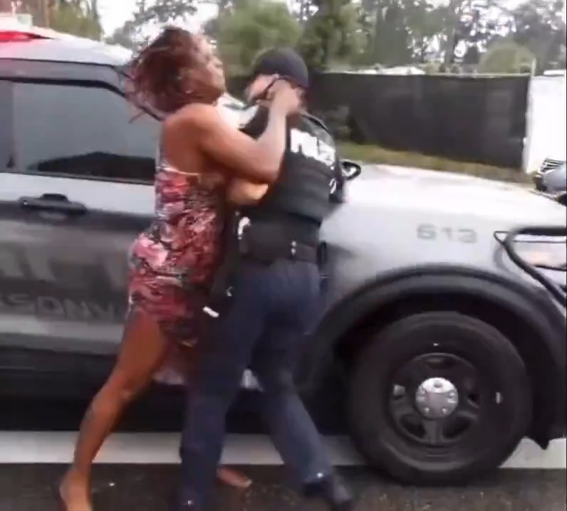 Woman (Erika McGriff, 39) with a suspended license leaves her illegally parked car unattended in the pickup line of her child's school in Jacksonville, Florida. A deputy approaches her and this is what ensues.... 👀 #CityLife #jacksonville #Florida #cops #FloridaWoman #FloridaMan #police #FAFO #biting #education #school #urban