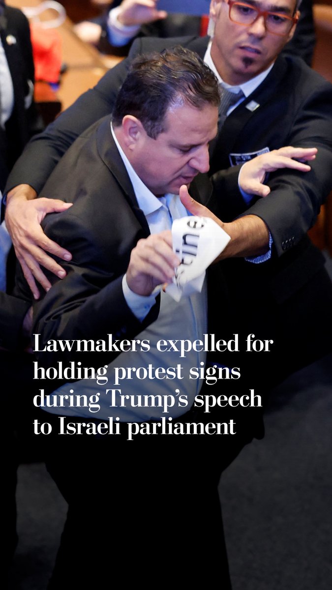 Knesset lawmakers Ofer Cassif and Ayman Odeh were removed from the chamber after holding up protest signs a few minutes into President Trump’s address to Israel's parliament.