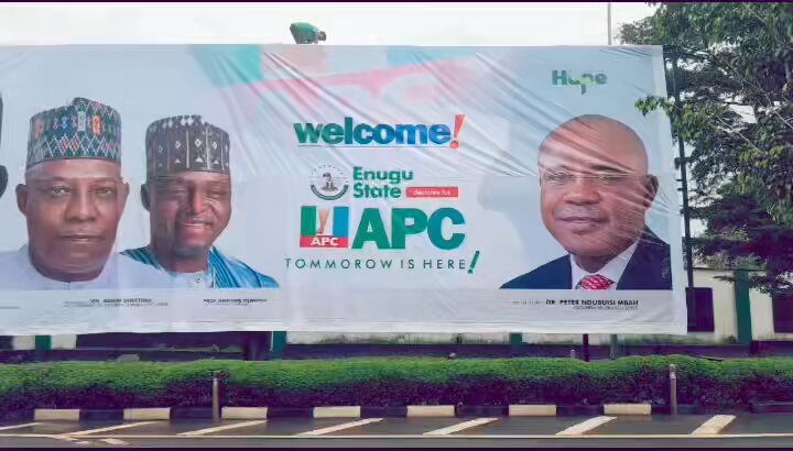 A billboard at Enugu Government House this morning features images of President Tinubu, Vice President Kashim Shettima, and APC National Chairman Prof. Nentawe Yilwatda. Today, Vice President Kashim Shettima. Senate President Godswill Obot Akpabio, APC National Chairman Prof. Nentawe Yilwatda, 23 other governors and other APC chieftains are set to arrive in Enugu to formally welcome Peter Mbah, the Governor of Enugu State, into the APC.