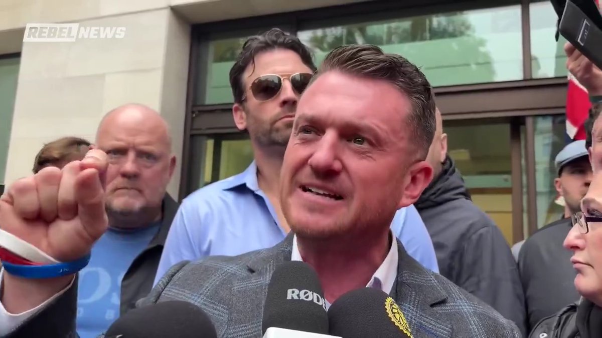 🚨Ezra Levant 🍁🚛 covers Tommy Robinson 🇬🇧's unprecedented trial under Terrorism Act Tommy is being charged under the U.K.'s Terrorism Act for allegedly failing to provide authorities with the Pin to unlock his mobile phone during a 'counter-terrorism examination'. Rebel News publisher Ezra Levant is on the ground in London, England as Tommy Robinson's trial under the U.K.'s Terrorism Act continues. The British journalist and activist was charged in 2024 after he reportedly refused to provide authorities with the Pin to unlock his mobile phone while he was stopped by law enforcement while attempting to leave the U.K. Tommy cited the protection of his journalistic materials and confidential sources as the reasoning for being unable to provide his Pin to the authorities. While Tommy was stopped by authorities in July 2024, he was not formally charged under the Terrorism Act until October 2024. One of the officers involved in the incident allegedly stated that he became suspicious because Tommy wouldn't make eye contact, was driving alone, and was in a high-value vehicle while he was being detained. Ezra discussed why the basis for Tommy's original detention and his charge under the Terrorism Act are likely not legitimate. "What was clear, was that the cops who stopped Tommy didn't ask him a single question about terrorism. They only asked him about his politics, about news, about things that you can Google," he said. "And that is not enough under the law to stop someone using the mighty Terrorism Act, which lets you arrest someone for any reason or no reason, for six hours, interrogate them, and they don't have the right to remain silent," Ezra continued. The British journalist and activist announced that he will be travelling to Israel to tour the nation following his trial on Tuesday in London. Tommy's sentencing hearing for his charge under the Terrorism Act is currently scheduled for November 4, 2025.