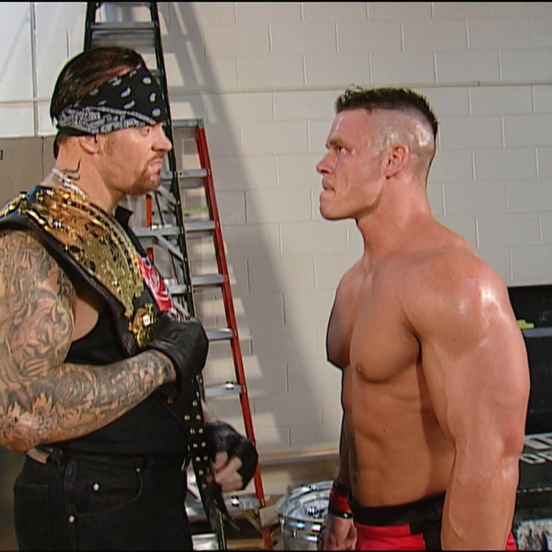 Posting an iconic John Cena moment every day until he retires. John Cena earns the respect of The Undertaker after a successful debut match against Kurt Angle on Smackdown. 56 days remain.