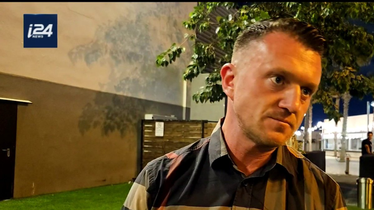 'The Labour Party has surrendered our country to jihad': far-right activist Tommy Robinson speaks to Owen Alterman during a controversial visit to Israel after he invited followers to join him in Birmingham after the UK police banned Maccabi Tel Aviv fans from the upcoming game