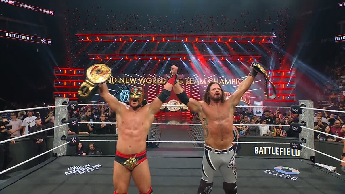 WE HAVE NEW WORLD TAG TEAM CHAMPIONS!!!! 🔥 Congratulations, AJ Styles & Dragon Lee!