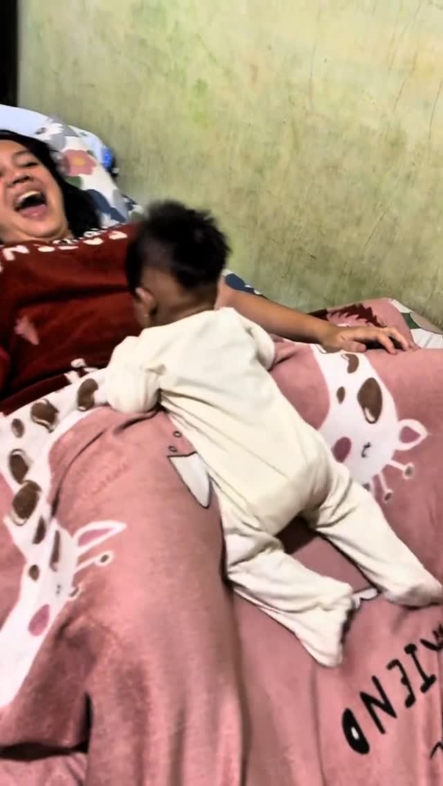 Why is she laughing? This is child abuse