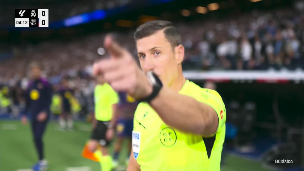 VAR concludes Vini Jr. fouled Lamine Yamal on this play. The original call was a penalty for Real Madrid. Drama early in ElClasico.
