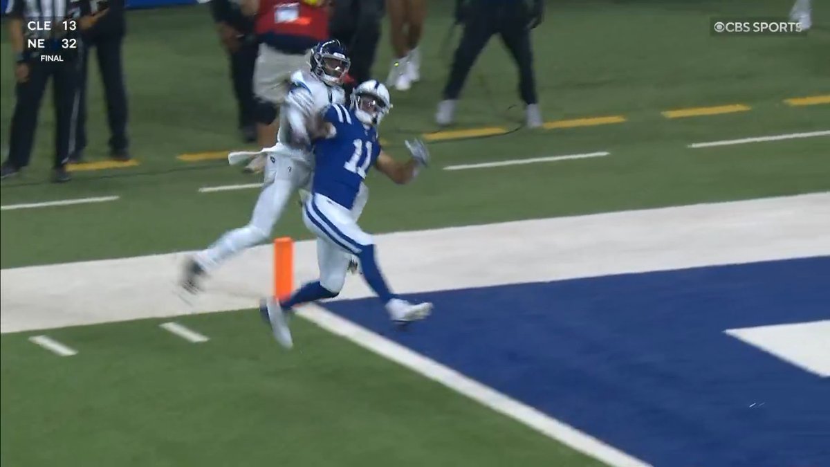 Michael Pittman Jr. just caught a touchdown by pinning the ball to his bicep while being interfered with by the defender. WOW. (Wait for the replay. It's amazing)