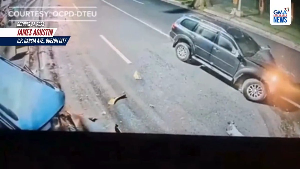 Nakunan sa CCTV ang banggaan ng dalawang sasakyan sa C.P. Garcia Avenue sa Quezon City bago mag hatinggabi noong Biyernes, Oct. 24, 2025. Sa imbestigasyon ng pulisya, galing sa C5 Katipunan ang SUV na papuntang University Avenue. Nawala sa linya ang SUV kaya nasalpok nito ang AUV na nasa kabilang lane ng kalsada. Naisugod sa ospital ang mga driver ng dalawang sasakyang nasangkot sa aksidente pero binawian sila ng buhay. Kritikal ang kondisyon ng babaeng sakay ng AUV. | via James Agustin/GMA Integrated News