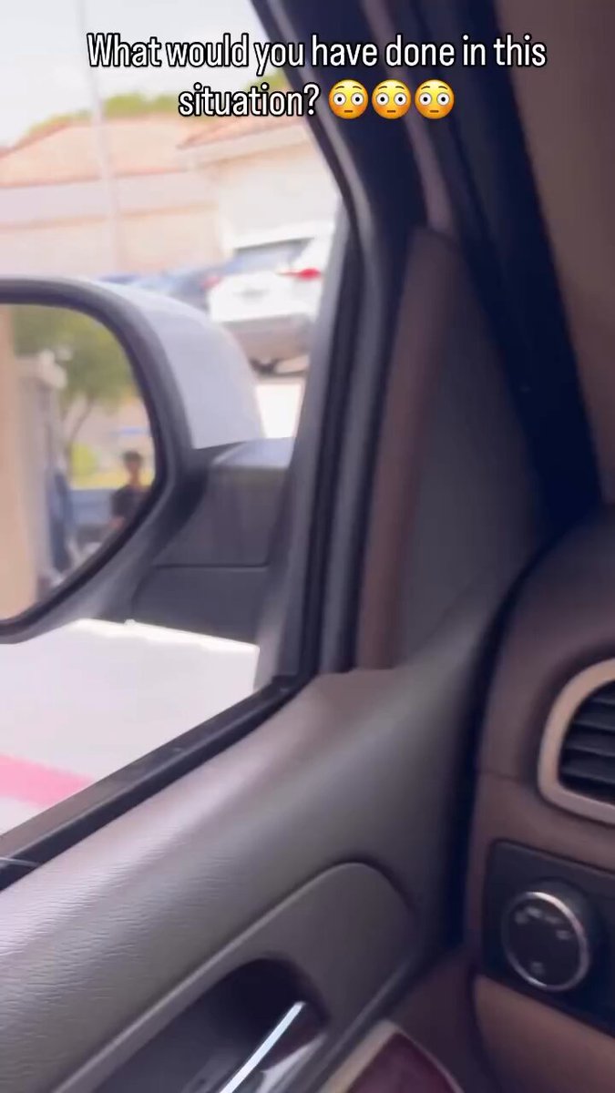 A heated fight at a 7-Eleven takes a terrifying turn 🚨 A furious driver aims her car at another woman as onlookers yell for her to move. “I’m on the phone with the cops!” she shouts, refusing to back down while chaos unfolds.