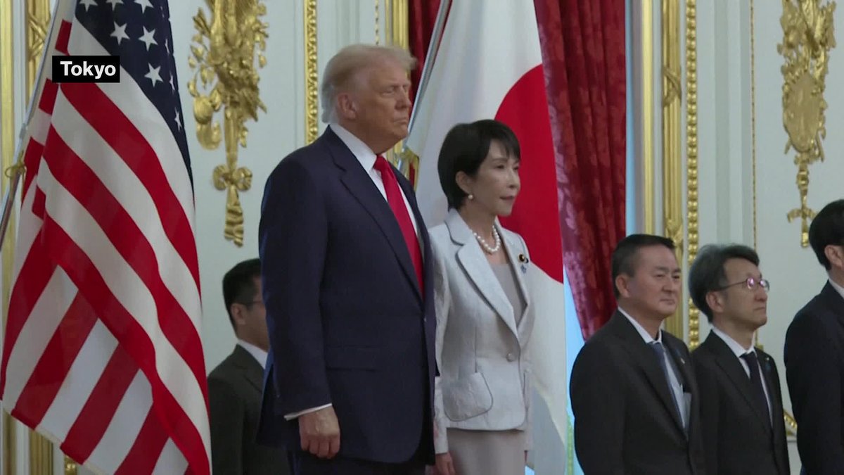 Japan's new Prime Minister Sanae Takaichi greets President Donald Trump at the welcome ceremony in Tokyo. Follow our blog for the latest news and analysis: