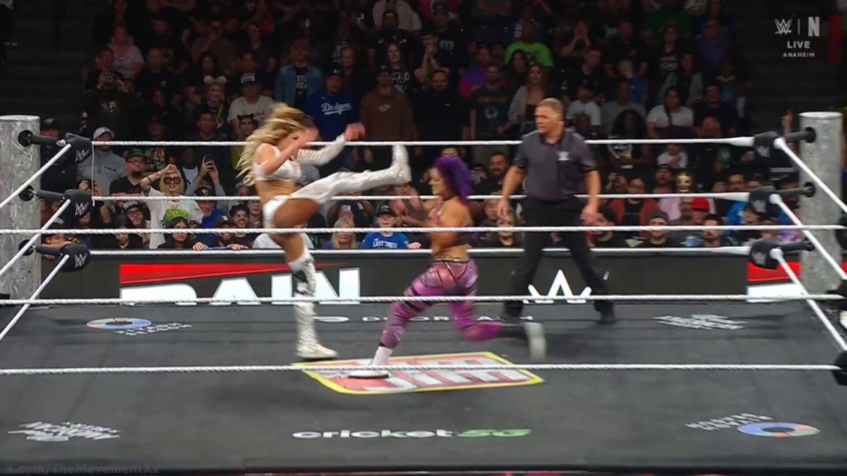CHARLOTTE FLAIR AND ALEXA BLISS RETAIN THE WOMEN'S TAG TEAM TITLES!!! #WWERaw