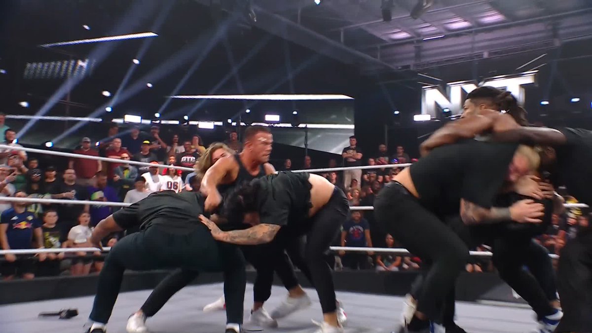 ABSOLUTE CHAOS. 😱 Ricky Saints and Trick Williams are throwing down and have to be separated by security!!!