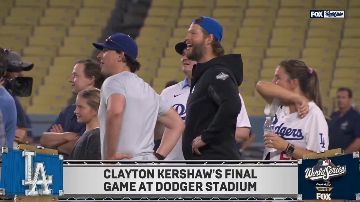 Clayton Kershaw takes a moment on the field after his last game as an active player at Dodger Stadium