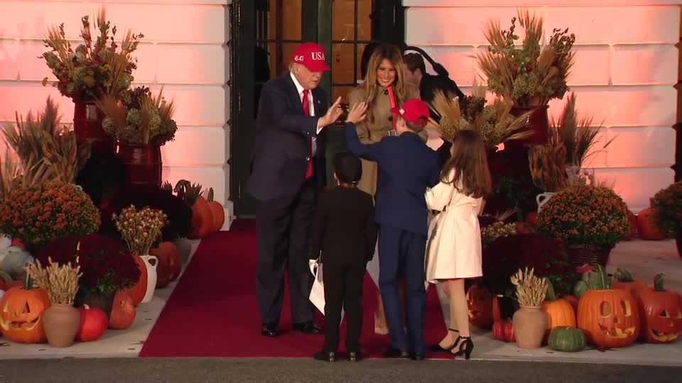 President Donald Trump and first lady Melania Trump handed out candy to children dressed as cartoon characters, movie heroes, and even Trump himself during the White House Halloween celebration