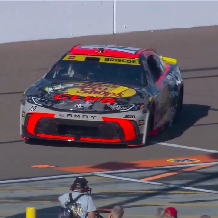 .Chase Briscoe carefully brings his No. 19 car to the garage for his team to assess the damage.